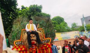 Pilar Naiki Reog Ponorogo saat Pawai Taaruf MTQ ke-14 Tangsel.(ski) Portalkota.id